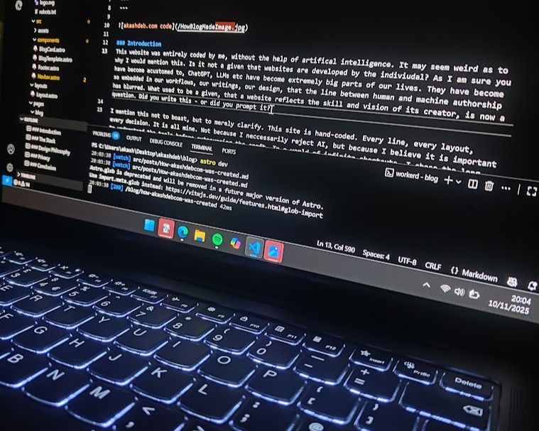 Picture of a Lenovo YOGA turned on with Visual Studio Code running